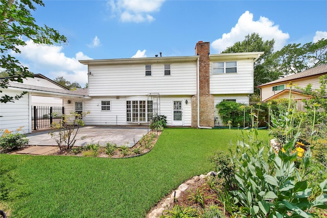 4822 Droddy St, Houston, TX 77091 - back of property with a patio area and a chimney