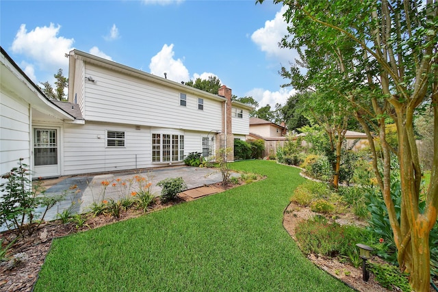 4822 Droddy St, Houston, TX 77091 - rear view of property with a patio area and a chimney