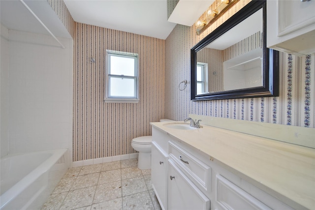 4822 Droddy St, Houston, TX 77091 - full bath featuring wallpapered walls, toilet, vanity, and baseboards