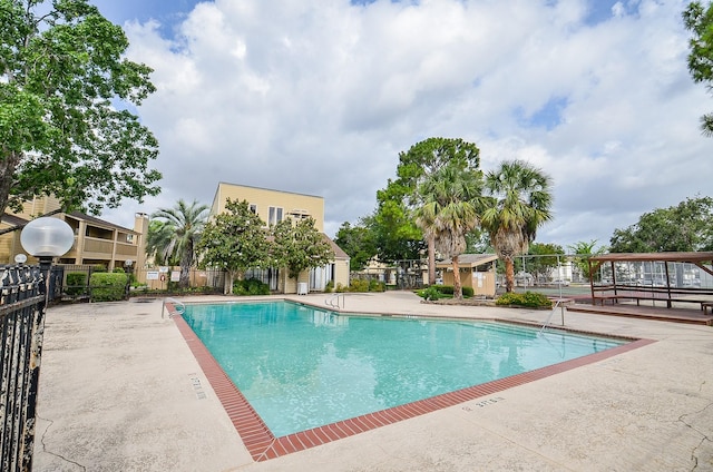 3538 Ocee St, Houston, TX 77063 - community pool featuring a patio