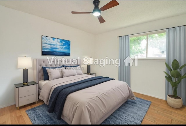 3538 Ocee St, Houston, TX 77063 - bedroom featuring light wood finished floors, baseboards, and ceiling fan