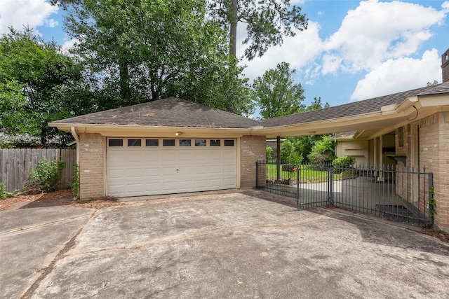 2812 Fairway Dr, Orange, TX 77630 - garage with fence and concrete driveway