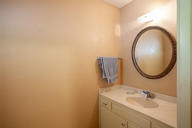 2812 Fairway Dr, Orange, TX 77630 - bathroom with vanity and a textured ceiling
