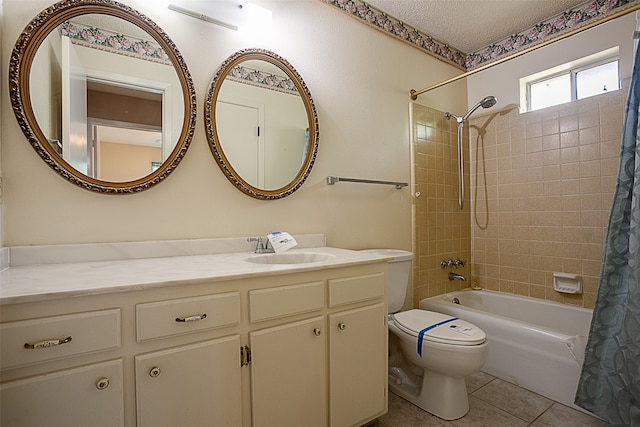 2812 Fairway Dr, Orange, TX 77630 - bathroom featuring shower / bath combo, tile patterned floors, toilet, vanity, and a textured ceiling