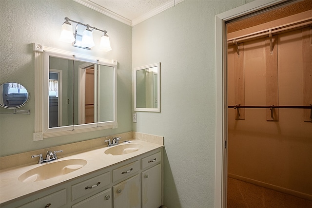 2812 Fairway Dr, Orange, TX 77630 - bathroom featuring ornamental molding, double vanity, and a walk in closet