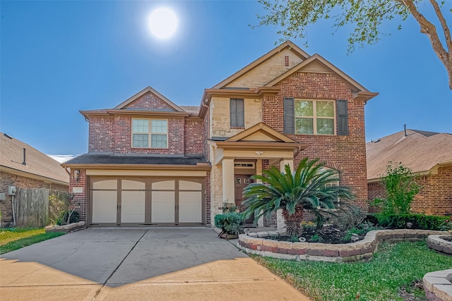 3619 Canton Hills Ln, Missouri City, TX 77459 - traditional-style home with an attached garage, driveway, brick siding, and fence