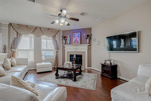 3619 Canton Hills Ln, Missouri City, TX 77459 - living room featuring ceiling fan, wood finished floors, a fireplace, and baseboards