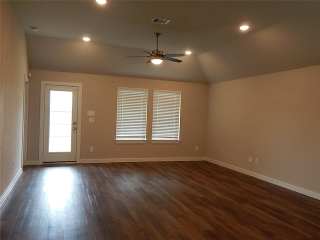 228 Rustic Ridge Cir, Magnolia, TX 77354 - empty room with vaulted ceiling, a ceiling fan, dark wood finished floors, baseboards, and recessed lighting