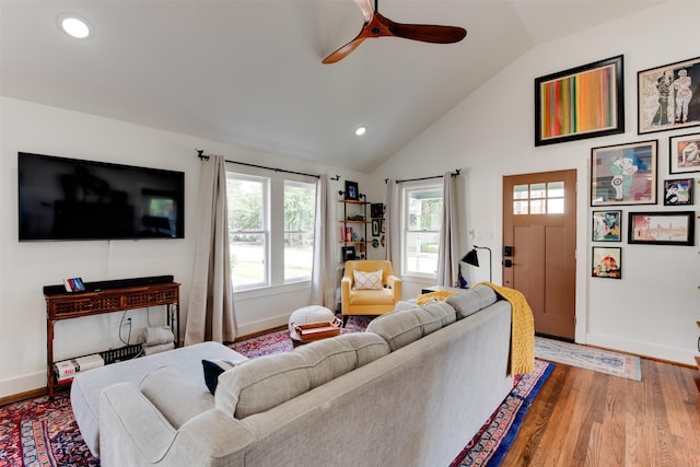 1127 Nadine St, Houston, TX 77009 - living room with vaulted ceiling, a ceiling fan, healthy amount of natural light, wood finished floors, and recessed lighting