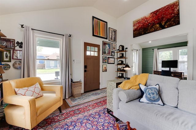 1127 Nadine St, Houston, TX 77009 - living area featuring wood finished floors and high vaulted ceiling