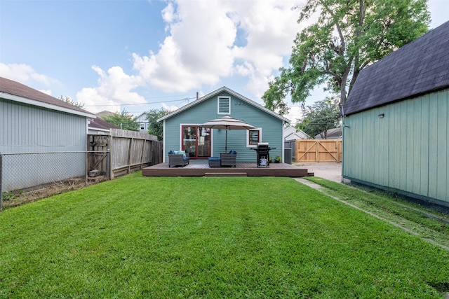 1127 Nadine St, Houston, TX 77009 - rear view of house with a wooden deck and an outdoor hangout area