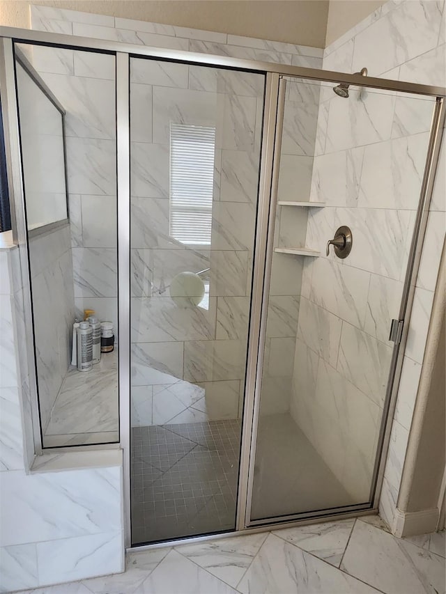 4723 Abercorn St, Rosharon, TX 77583 - bathroom with marble look tiles and a shower stall