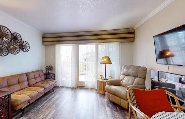 6300 Seawall Blvd Unit 3113, Galveston, TX 77551 - living area featuring crown molding and wood finished floors