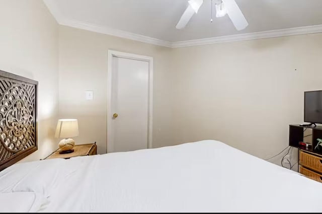 6300 Seawall Blvd Unit 3113, Galveston, TX 77551 - bedroom with crown molding and a ceiling fan