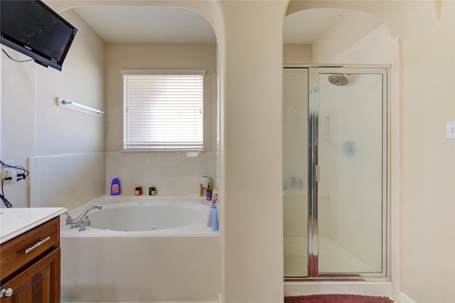 2127 Linden Rock Dr, Katy, TX 77494 - full bathroom with a shower stall, vanity, and a tub with jets
