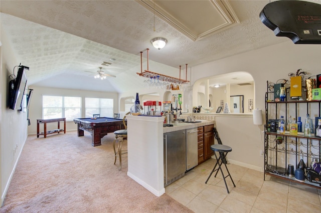 2127 Linden Rock Dr, Katy, TX 77494 - kitchen featuring billiards table, ceiling fan, baseboards, arched walkways, and lofted ceiling