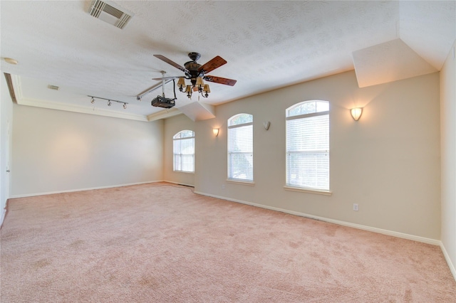 2127 Linden Rock Dr, Katy, TX 77494 - spare room featuring ceiling fan, baseboards, carpet flooring, and a textured ceiling