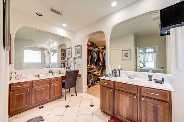 2127 Linden Rock Dr, Katy, TX 77494 - bathroom with vanity, tile patterned flooring, a spacious closet, and recessed lighting