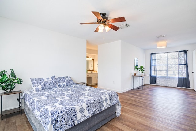 102 Banyan St, Lake Jackson, TX 77566 - bedroom featuring wood finished floors and a ceiling fan