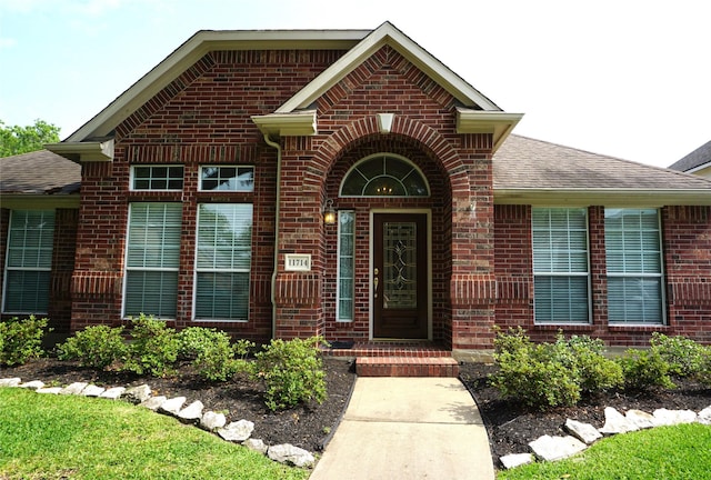 11714 Goldstream Ct, Tomball, TX 77377 - entrance to property featuring brick siding and roof with shingles