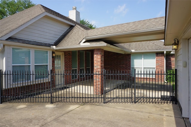 11714 Goldstream Ct, Tomball, TX 77377 - view of front of property featuring brick siding, a shingled roof, and a chimney