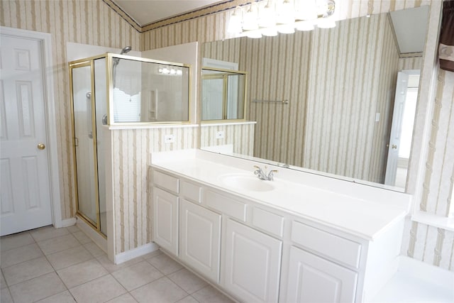 11714 Goldstream Ct, Tomball, TX 77377 - full bath featuring wallpapered walls, tile patterned flooring, a shower stall, vanity, and baseboards