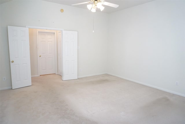 11714 Goldstream Ct, Tomball, TX 77377 - spare room featuring ceiling fan, light colored carpet, and baseboards