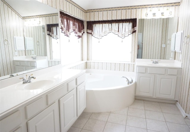 11714 Goldstream Ct, Tomball, TX 77377 - full bath with tile patterned floors, healthy amount of natural light, a bath, two vanities, and wallpapered walls