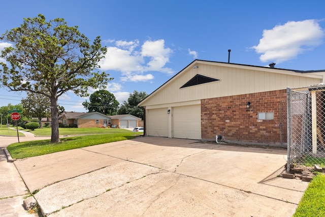 4302 Marchant Rd, Houston, TX 77047 - view of property exterior featuring brick siding and a garage