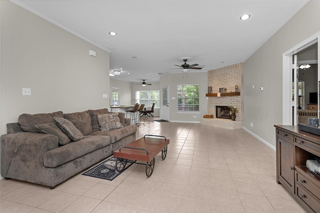 living room with recessed lighting, a ceiling fan, baseboards, light tile patterned flooring, and a fireplace
