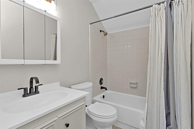 full bathroom with toilet, shower / bath combo with shower curtain, and vanity