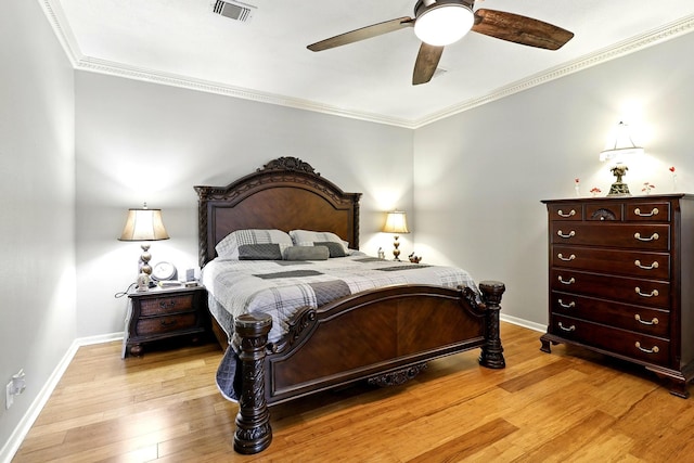 17714 Treeloch Ln, Spring, TX 77379 - bedroom with baseboards, wood finished floors, ornamental molding, and ceiling fan