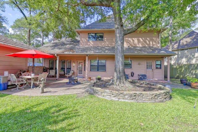 17714 Treeloch Ln, Spring, TX 77379 - back of property featuring a patio