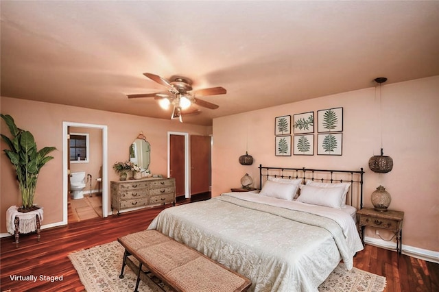 3428 S Main St, Anahuac, TX 77514 - bedroom featuring wood finished floors, baseboards, connected bathroom, and ceiling fan