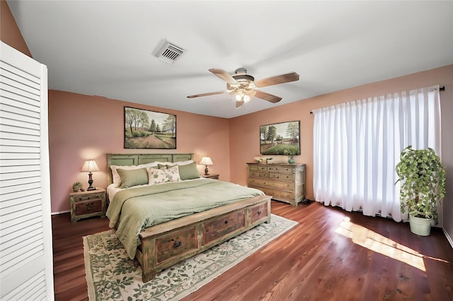 3428 S Main St, Anahuac, TX 77514 - bedroom featuring wood finished floors and ceiling fan