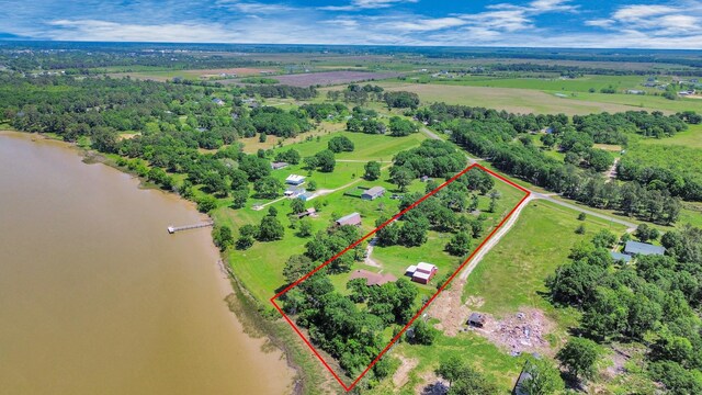 3428 S Main St, Anahuac, TX 77514 - aerial view of sparsely populated area featuring property boundaries highlighted and a large body of water