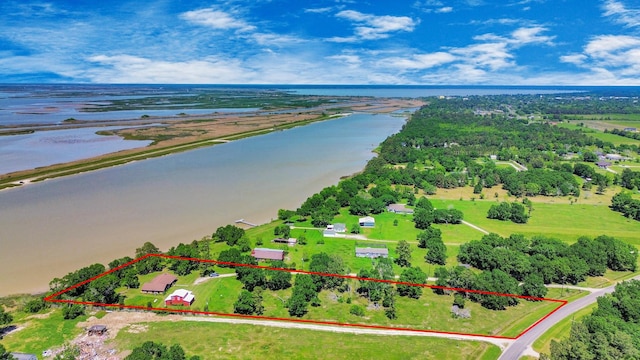 3428 S Main St, Anahuac, TX 77514 - aerial overview of property's location featuring a large body of water and property parcel outlined