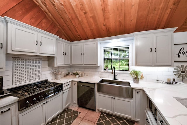 3428 S Main St, Anahuac, TX 77514 - kitchen with black appliances, a sink, tasteful backsplash, wood ceiling, and light tile patterned floors