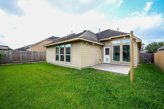 10911 Overland Trail Dr, Richmond, TX 77406 - back of house featuring a patio area and roof with shingles
