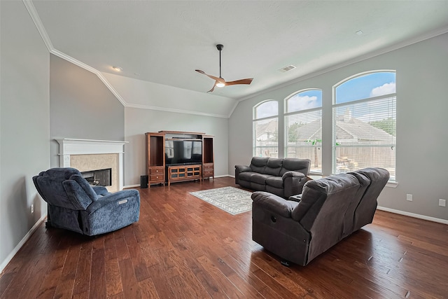 13903 Autumn Grove Ct, Rosharon, TX 77583 - living area featuring a ceiling fan, baseboards, crown molding, plenty of natural light, and a fireplace