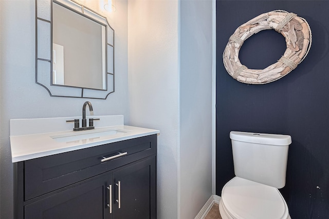 13903 Autumn Grove Ct, Rosharon, TX 77583 - half bath featuring vanity, toilet, and baseboards