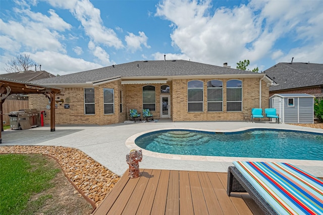 13903 Autumn Grove Ct, Rosharon, TX 77583 - view of swimming pool featuring a storage shed, a patio area, an outdoor structure, and grilling area