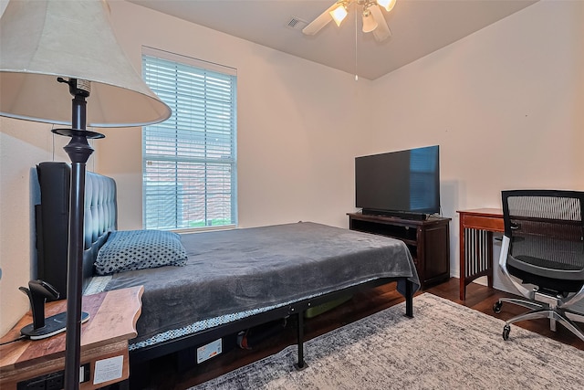 13903 Autumn Grove Ct, Rosharon, TX 77583 - bedroom with multiple windows, wood finished floors, and a ceiling fan