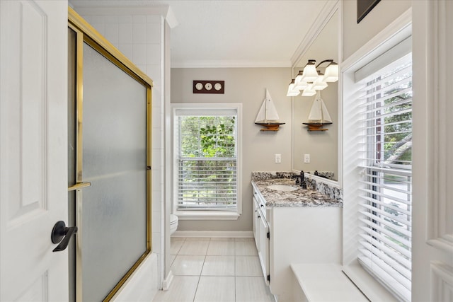 311 Pineview Cir, El Lago, TX 77586 - full bathroom with toilet, vanity, crown molding, tile patterned flooring, and baseboards