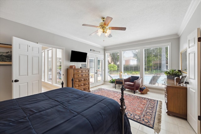 311 Pineview Cir, El Lago, TX 77586 - bedroom featuring french doors, access to exterior, light tile patterned floors, crown molding, and a textured ceiling