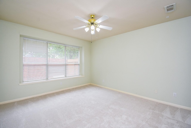 7218 Welshwood Ln, Sugar Land, TX 77479 - empty room featuring light colored carpet, ceiling fan, and baseboards