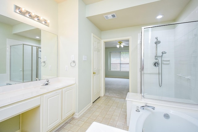 7218 Welshwood Ln, Sugar Land, TX 77479 - full bathroom with vanity, tiled shower, a garden tub, recessed lighting, and ceiling fan
