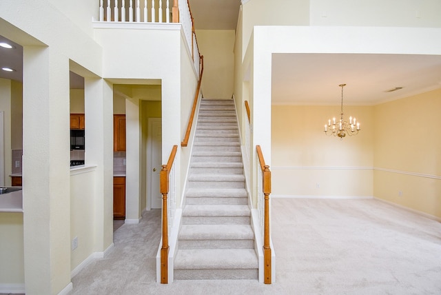 7218 Welshwood Ln, Sugar Land, TX 77479 - stairway with carpet, baseboards, and a chandelier