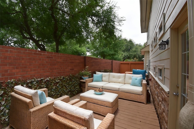 7218 Welshwood Ln, Sugar Land, TX 77479 - fenced backyard with an outdoor hangout area and a wooden deck