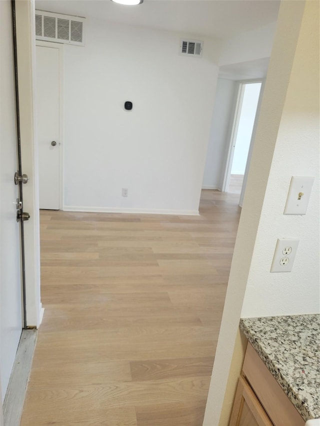 8425 Hearth Dr Unit 25, Houston, TX 77054 - spare room with light wood-style floors and baseboards